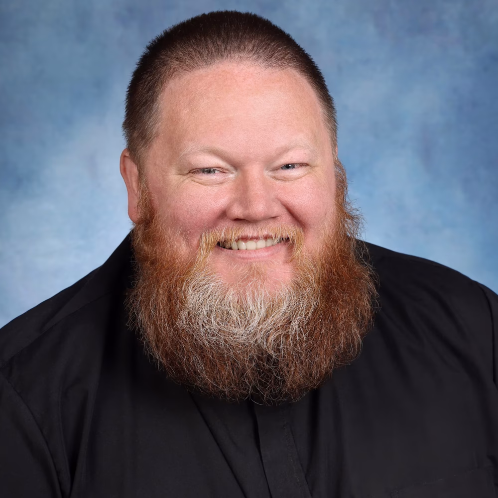 Father Chad Hill Pastor of St. John the Baptist - Covington and Holy Spirit - Kent.